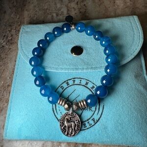 Blue Beaded Bracelet with Silver Charm